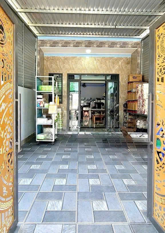 Bán nhà 1 Trệt 1 Lầu lửng Dĩ An,đường nhựa 10M thông,Kinh Doanh tốt