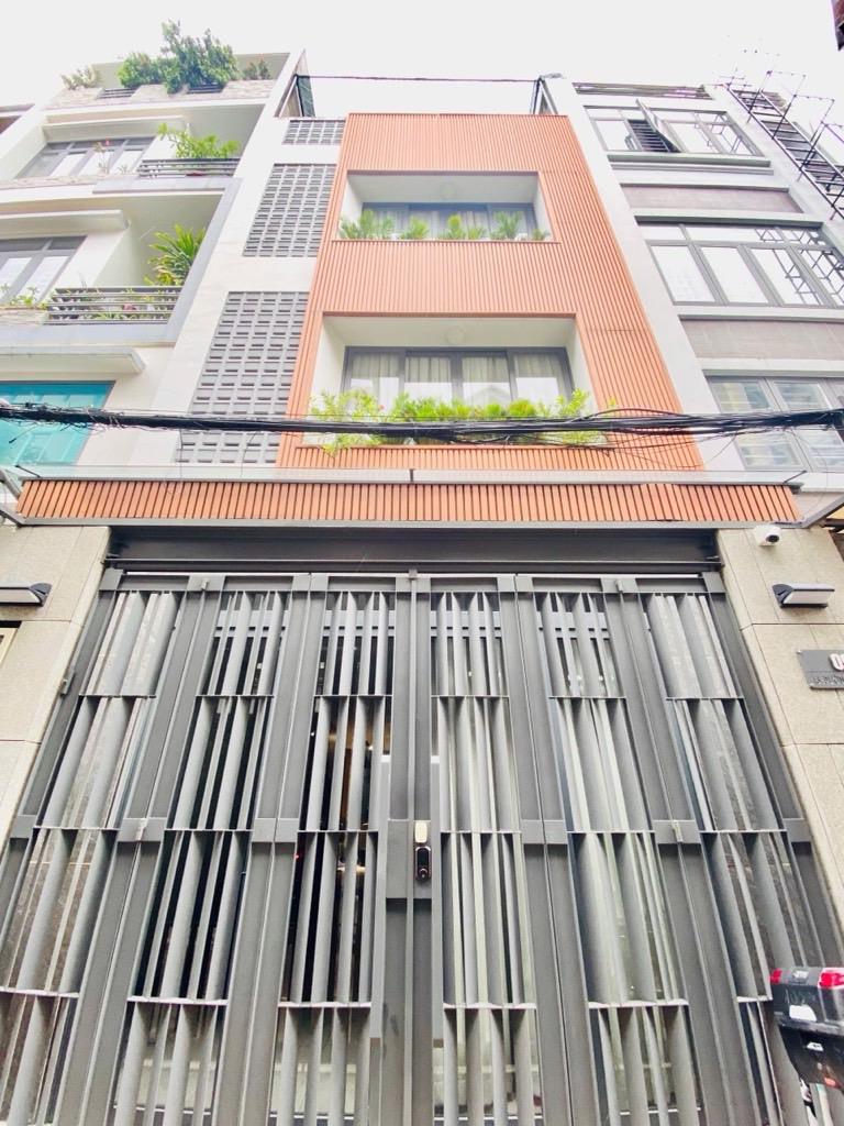 Bán gấp nhà hẻm xe hơi đường C1, Tân Bình: 84m2, 4 tầng, 4PN, sổ đỏ trao tay, giá hời chỉ 18.5 tỷ! Gọi ngay 0789892658.